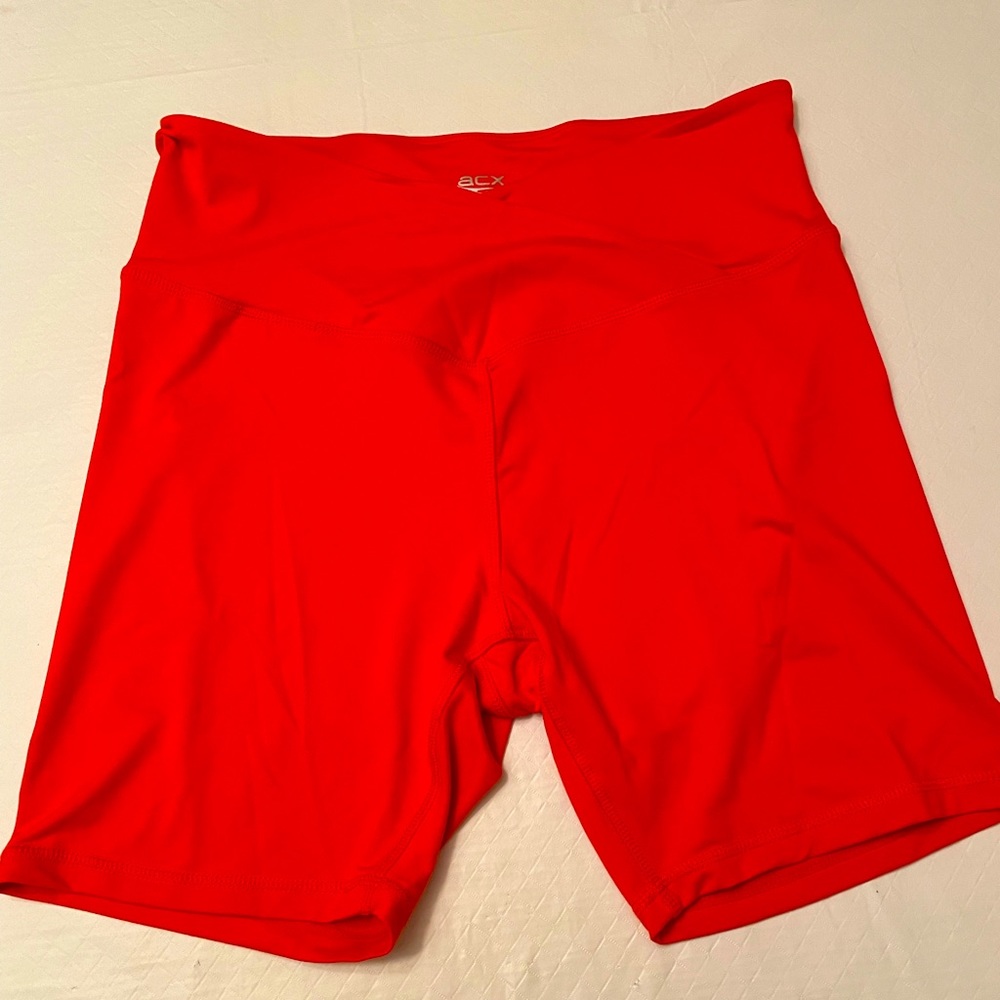 ACX Orange XL Biker length Shorts with 6” inseam.